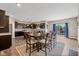 Open dining room features a large table with seating for eight near the kitchen at 6923 Bryant Pl, Plainfield, IN 46168