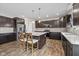 Well-equipped kitchen with stainless steel appliances and center island with chairs at 6923 Bryant Pl, Plainfield, IN 46168