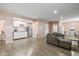 Versatile space including living and kitchen areas, furnished with comfortable seating and stainless-steel appliances at 6923 Bryant Pl, Plainfield, IN 46168