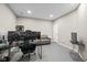 Spacious office with multiple monitors and a comfortable seating area at 6923 Bryant Pl, Plainfield, IN 46168