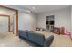 Finished basement featuring a cozy couch and decorative items at 7141 Ember Ct, Indianapolis, IN 46236