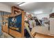A cluttered storage area with shelving and lots of miscellaneous items at 7141 Ember Ct, Indianapolis, IN 46236