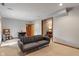 Finished basement featuring a cozy couch and natural lighting at 7141 Ember Ct, Indianapolis, IN 46236