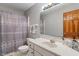 Bathroom featuring a shower and white vanity at 7141 Ember Ct, Indianapolis, IN 46236
