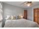Bedroom featuring a decorative comforter and pillows at 7141 Ember Ct, Indianapolis, IN 46236