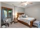 Bedroom featuring a ceiling fan, bed, and window with natural light at 7141 Ember Ct, Indianapolis, IN 46236