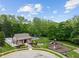 Aerial view of community amenities including a pool, playground, and well-maintained landscaping near cul-de-sac at 7141 Ember Ct, Indianapolis, IN 46236