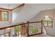 Bright foyer with hardwood floors, detailed railing, and natural light at 7141 Ember Ct, Indianapolis, IN 46236