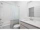 Bathroom features a shower-tub combo and neutral finishes at 7431 Stillness Dr, Indianapolis, IN 46268