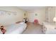 Cheerful bedroom with single bed, white dresser, and closet offering ample storage and charming decor at 8120 Trevellian Way, Indianapolis, IN 46217