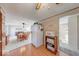 A kitchen and dining area featuring white appliances and wooden furniture at 8120 Trevellian Way, Indianapolis, IN 46217