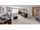 Cozy living room with comfortable seating, neutral tones, and a bright window at 8120 Trevellian Way, Indianapolis, IN 46217