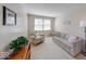Cozy sitting room featuring comfortable seating and a large window at 8120 Trevellian Way, Indianapolis, IN 46217