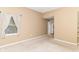 Neutral bedroom with carpet flooring and a doorway leading to other rooms at 8713 Champions Dr, Indianapolis, IN 46256