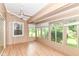 Large enclosed patio featuring multiple windows providing ample light and views at 8713 Champions Dr, Indianapolis, IN 46256