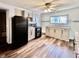 Updated kitchen with black appliances, modern cabinets, and a bright window over the sink at 901 Columbia Ave, Alexandria, IN 46001
