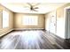 Bright living room with new floors, large windows, and neutral walls at 901 Columbia Ave, Alexandria, IN 46001