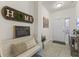 Inviting entryway featuring neutral tones and decorative accents, creating a warm and welcoming atmosphere at 998 Cherry Tree Ln, Greenwood, IN 46143