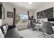 Bright home office with a large window, providing a comfortable and productive workspace at 998 Cherry Tree Ln, Greenwood, IN 46143