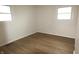 Bright bedroom with hardwood floors and windows letting in plenty of natural light at 1021 Harney Dr, Lebanon, IN 46052