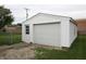 Detached garage with a large overhead door and side entry at 1021 Harney Dr, Lebanon, IN 46052
