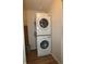 Efficient stackable washer and dryer unit, maximizing space in the laundry area at 1021 Harney Dr, Lebanon, IN 46052