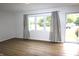 Light filled living room featuring new flooring and large window at 1021 Harney Dr, Lebanon, IN 46052