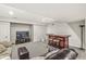 Finished basement featuring bar, seating area, and door to utility area at 10697 Woodmont Ln, Fishers, IN 46037