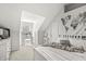 Bright bedroom featuring vaulted ceiling, white furniture, and decor at 10697 Woodmont Ln, Fishers, IN 46037