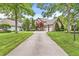 The property features a well-manicured lawn and beautiful landscaping, enhancing its curb appeal at 10697 Woodmont Ln, Fishers, IN 46037