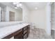 Bathroom featuring a vanity, toilet, and shower, offering a clean and functional space at 107 Elliott Ave, Trafalgar, IN 46181