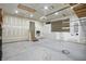 Spacious garage with concrete floor and walls ready for finishing and customizations at 10722 Landsbrook N Run, Noblesville, IN 46060