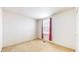 Cozy bedroom featuring neutral carpeting and a window offering natural light at 1129 Central Park S Blvd, Greenwood, IN 46143