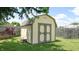 Exterior shed with double doors, ideal for storing gardening equipment and outdoor tools at 1129 Central Park S Blvd, Greenwood, IN 46143