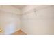 Empty walk-in closet with a practical white wire shelving system for organized storage at 1129 Central Park S Blvd, Greenwood, IN 46143