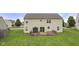 Expansive backyard view features a large deck perfect for outdoor entertaining and relaxation at 11531 Short Iron Ln, Indianapolis, IN 46235