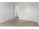 Bedroom with carpet, white walls, and view to hall at 11531 Short Iron Ln, Indianapolis, IN 46235