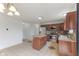 Modern eat-in kitchen featuring stainless steel appliances, tile backsplash, and a kitchen island at 11531 Short Iron Ln, Indianapolis, IN 46235