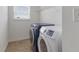 Convenient laundry area with modern washer and dryer units at 11531 Short Iron Ln, Indianapolis, IN 46235