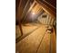 Unfinished attic space with exposed wooden beams and flooring, offering potential for storage or customization at 12231 Valley View Cir, Indianapolis, IN 46229