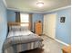 Cozy bedroom with a full bed, dresser, and soft natural light at 12231 Valley View Cir, Indianapolis, IN 46229
