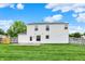 Spacious backyard featuring a green lawn, patio, privacy fence, and a view of the house at 1234 Breaside Cir, Greenwood, IN 46143