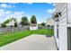 A spacious, well-maintained backyard featuring a patio, shed, green lawn, and a wooden privacy fence at 1234 Breaside Cir, Greenwood, IN 46143