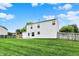 Generously sized backyard with a green lawn, patio, and privacy fence at 1234 Breaside Cir, Greenwood, IN 46143
