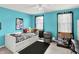 Bright bedroom with teal walls, neutral carpet, and window at 1234 Breaside Cir, Greenwood, IN 46143