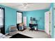 Bedroom with teal walls, neutral carpet, and furniture at 1234 Breaside Cir, Greenwood, IN 46143