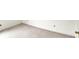 Close-up of neutral carpeting and white base trim and walls; electrical box in view at 1234 Breaside Cir, Greenwood, IN 46143
