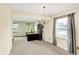 Open dining area with neutral walls and carpeting, as well as views of the office area at 1234 Breaside Cir, Greenwood, IN 46143