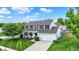 Charming two-story home with a manicured lawn, mature trees, and a two-car garage at 1234 Breaside Cir, Greenwood, IN 46143