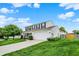 Home featuring a well-kept lawn, classic white siding, black shutters, and an attached two-car garage at 1234 Breaside Cir, Greenwood, IN 46143
